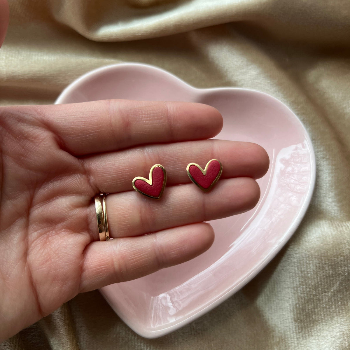 Gold Trimmed Heart Studs